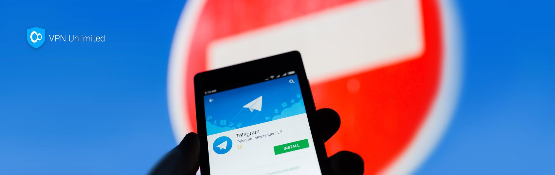Man holding a smartphone with Telegram app on the screen - looking into ways to bypass the blocks
