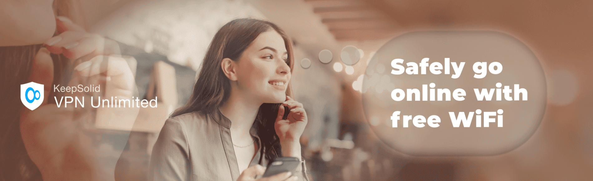 Girl using iPhone on public WiFi in a cafe