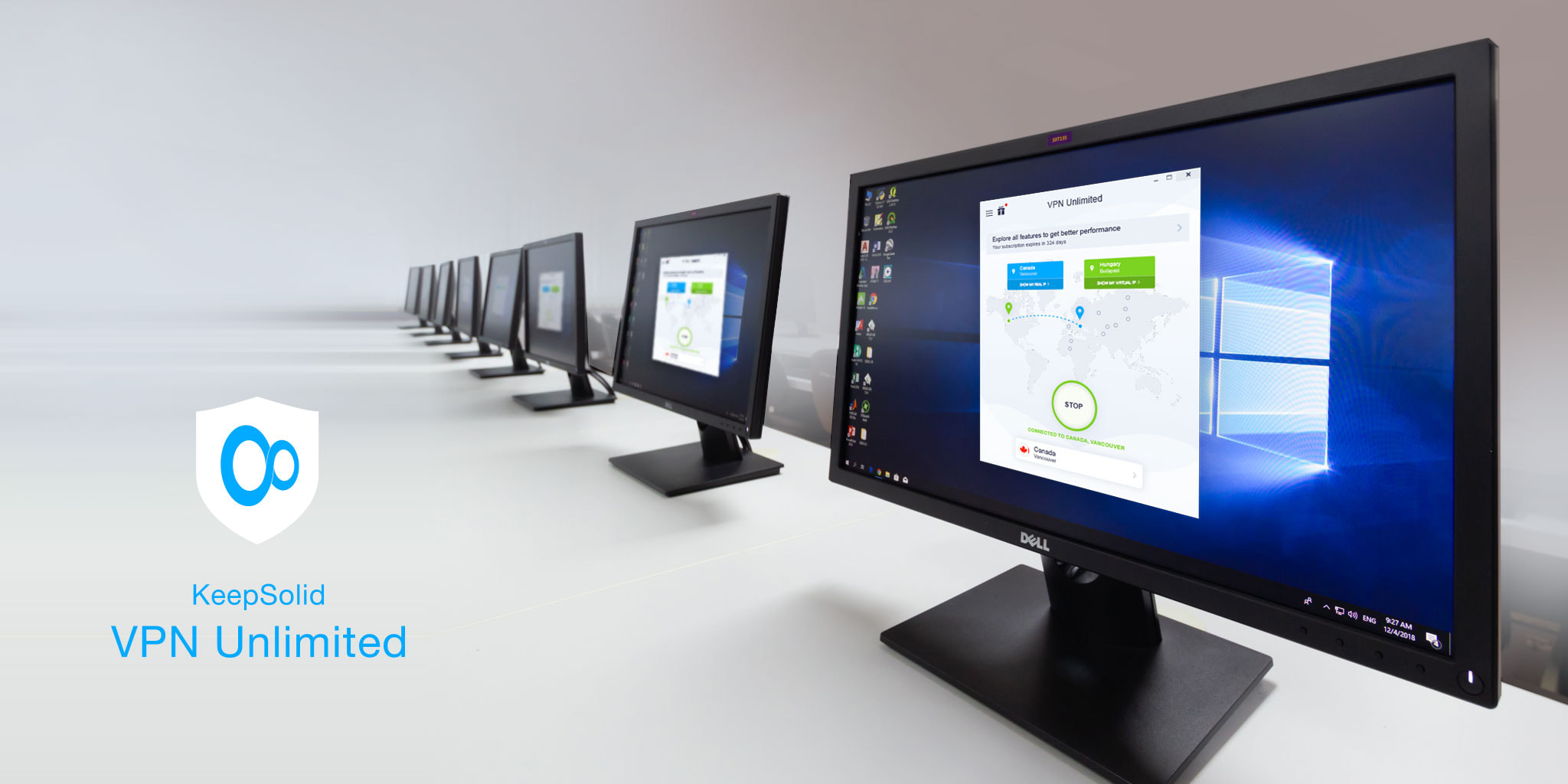 Computer monitors showing the screen with Microsoft Windows 10 and VPN Unlimited