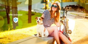 Cyclist girl with a dog relaxing in a park enjoying online protection from KeepSolid VPN Unlimited